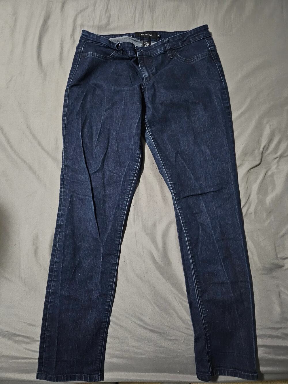 Calvin Klein Jeans dark wash skinny jeans five pocket zip fly faded whiskering